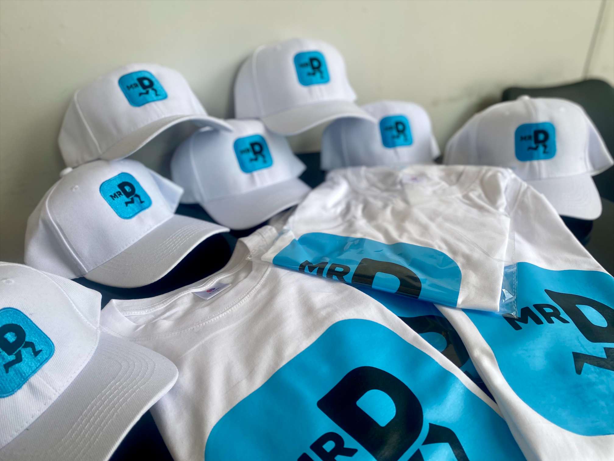 Mr D caps and t-shirts