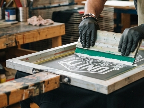 Bold screen printed graphic on a Rosebank College tote bag